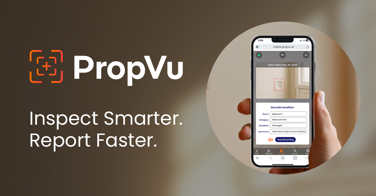 Hand holding a mobile phone during an on-site home inspection using PropVu.