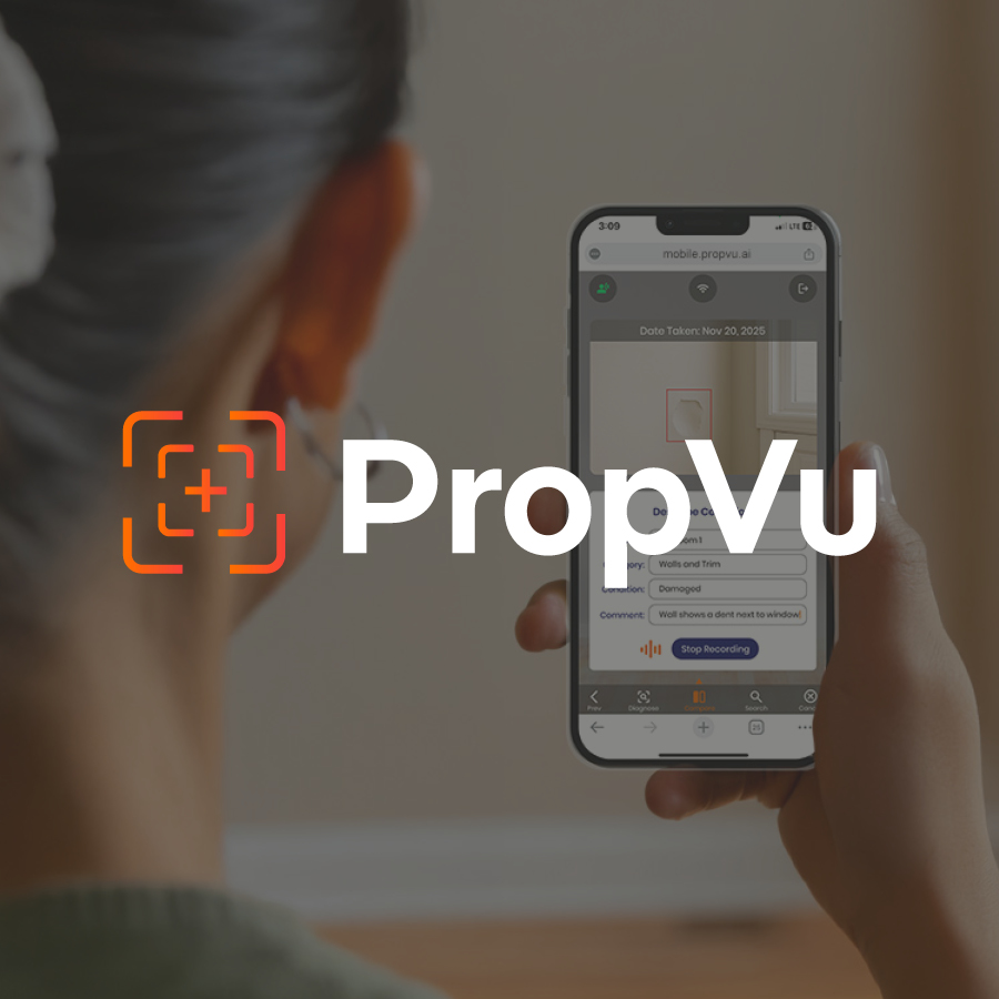 Woman using a mobile device to complete a home inspection with PropVu.