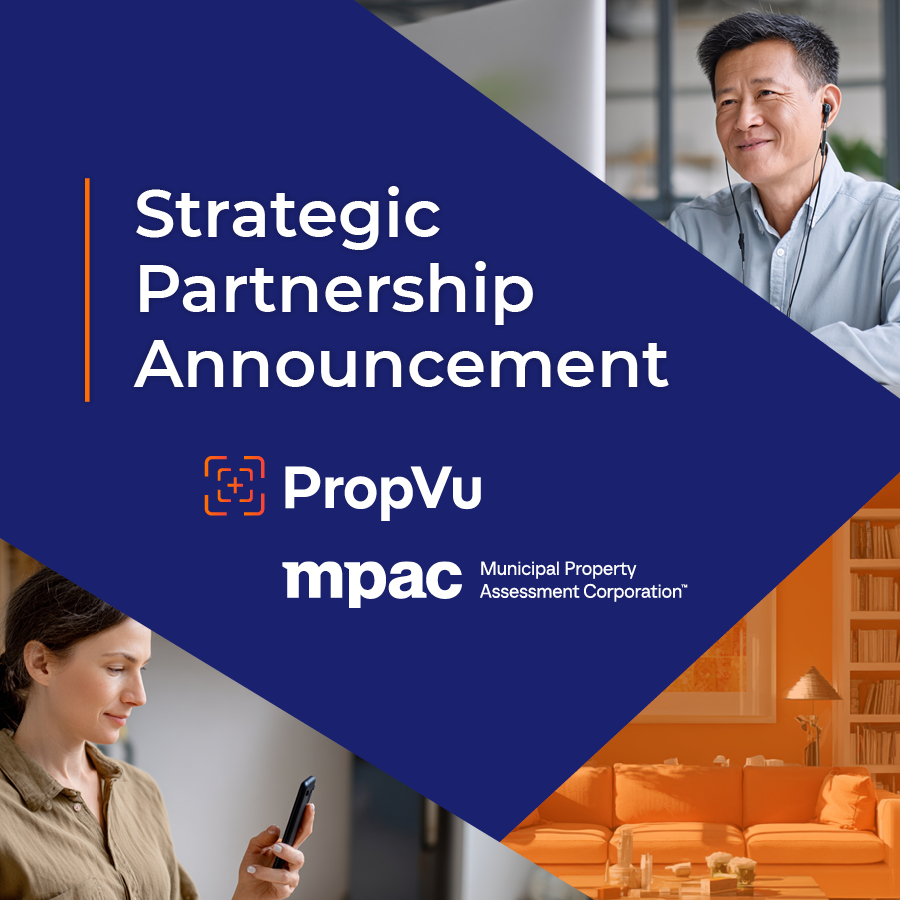 Middle-aged woman using a smartphone and middle-aged man working on a computer facing each other.