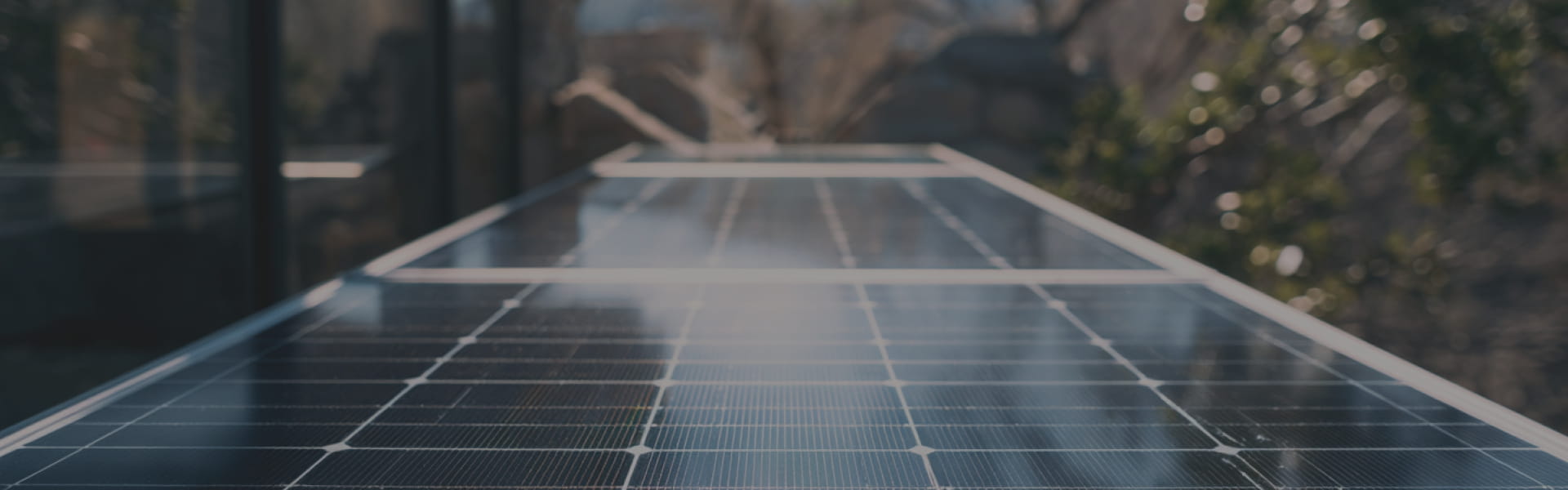 Solar panels mounted on a flat roof capturing sunlight for renewable energy.